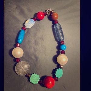 Chunky multi colored necklace with turquoise cross